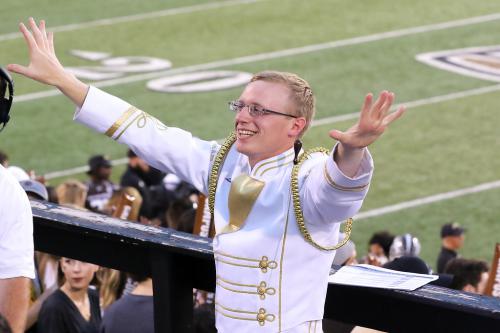 Conducting in the stands at Waldo Stadium.